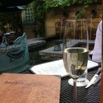 a glass of champane on the patio at Barking Frog a glass of champane on the patio at Barking Frog