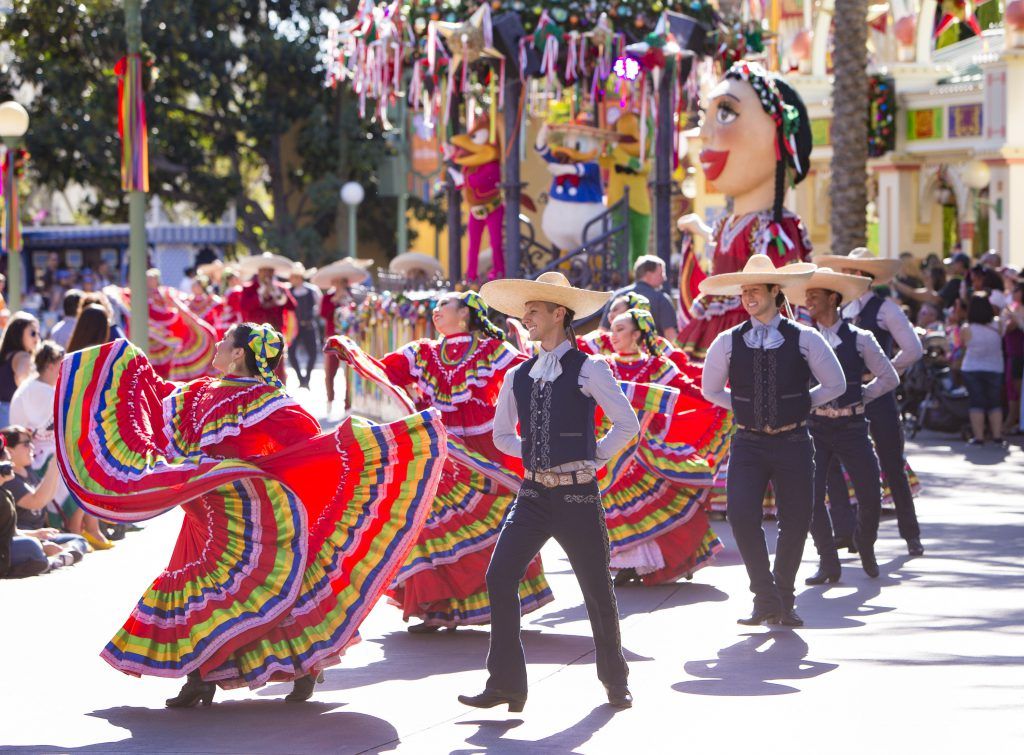 ÁVIVA NAVIDAD! AT FESTIVAL OF HOLIDAYS -- The new Festival of Holidays at Disney California Adventure park celebrates holiday festivities of diverse cultures with music, dance and craft-making, plus food at the Festive Foods Marketplace. The daily lineup of entertainment includes nearly 50 performances of nine unique shows, with special Disney characters, street parties, cavalcades, musical ensembles and dance performances. The celebrations include Diwali, Hanukkah, Kwanzaa, Christmas/Navidad and Three Kings Day. Guests can look for performances of traditional Indian dance that builds to a Bollywood party, a Klezmer band with a new global sound, the Mariachi Divas and an a cappella vocal group that puts an R&B spin on holiday songs. (Scott Brinegar/Disneyland Resort)