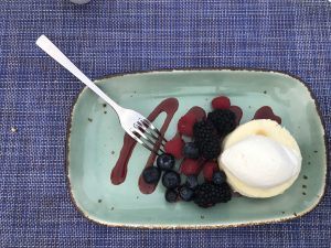 ice cream with berries and carmel