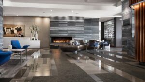 two people stand behind the desk in the four seasons seattle lobby