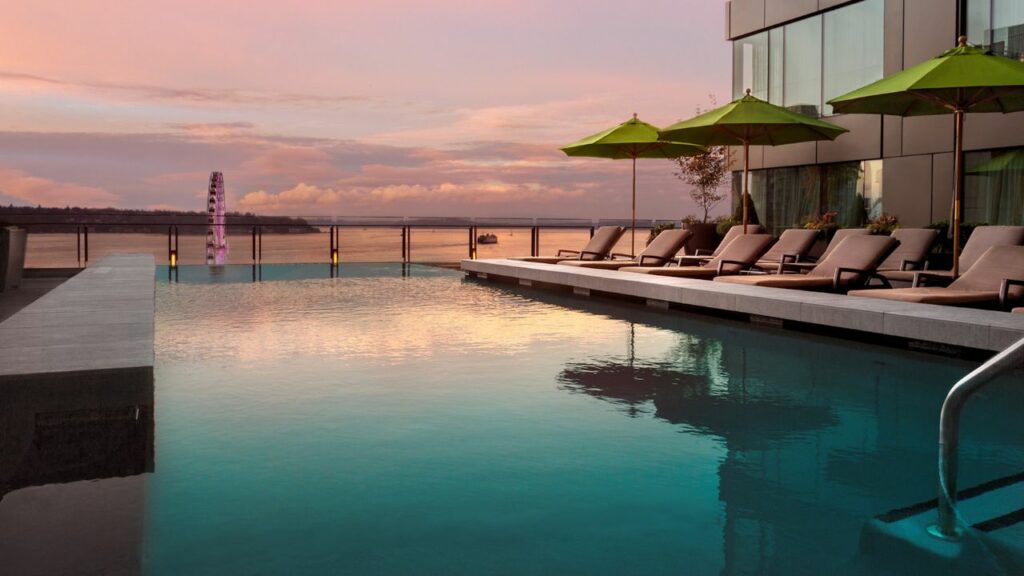 sunset at the infinity pool at four seasons seattle